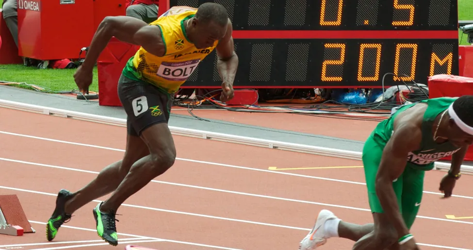 Runner Usain Bolt beginning a race