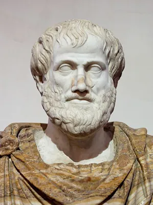 A marble statue of Aristotle.