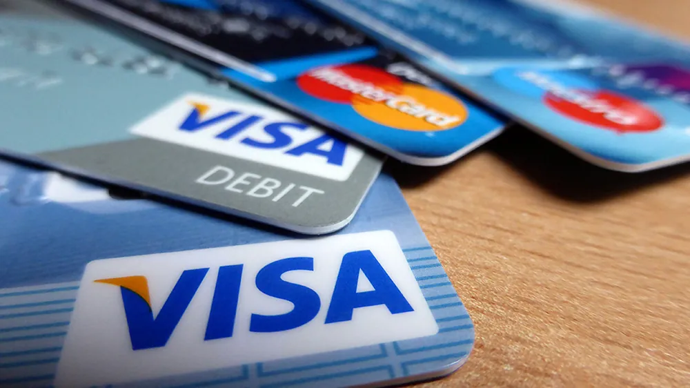 A series of VISA credit and debit cards.