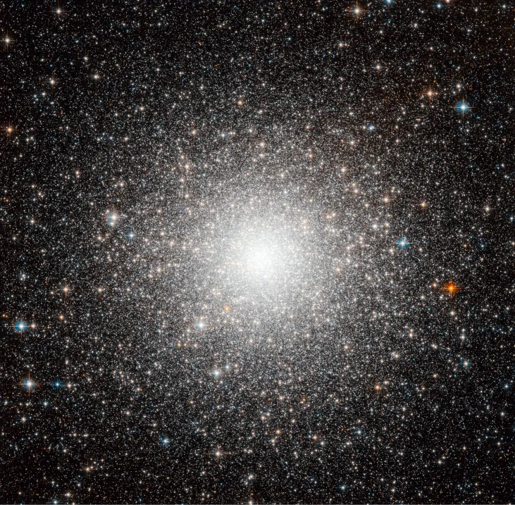 Globular Cluster M54. A nearly perfectly spherical cluster of stars, so dense that the central core appears as a bright patch of light rather than individual stars.