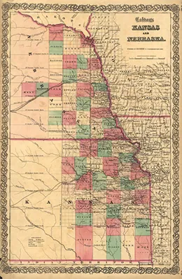 A historic map shows the territories of Kansas and Nebraska in 1855, as well as proposed routes of the transcontinental railroad.