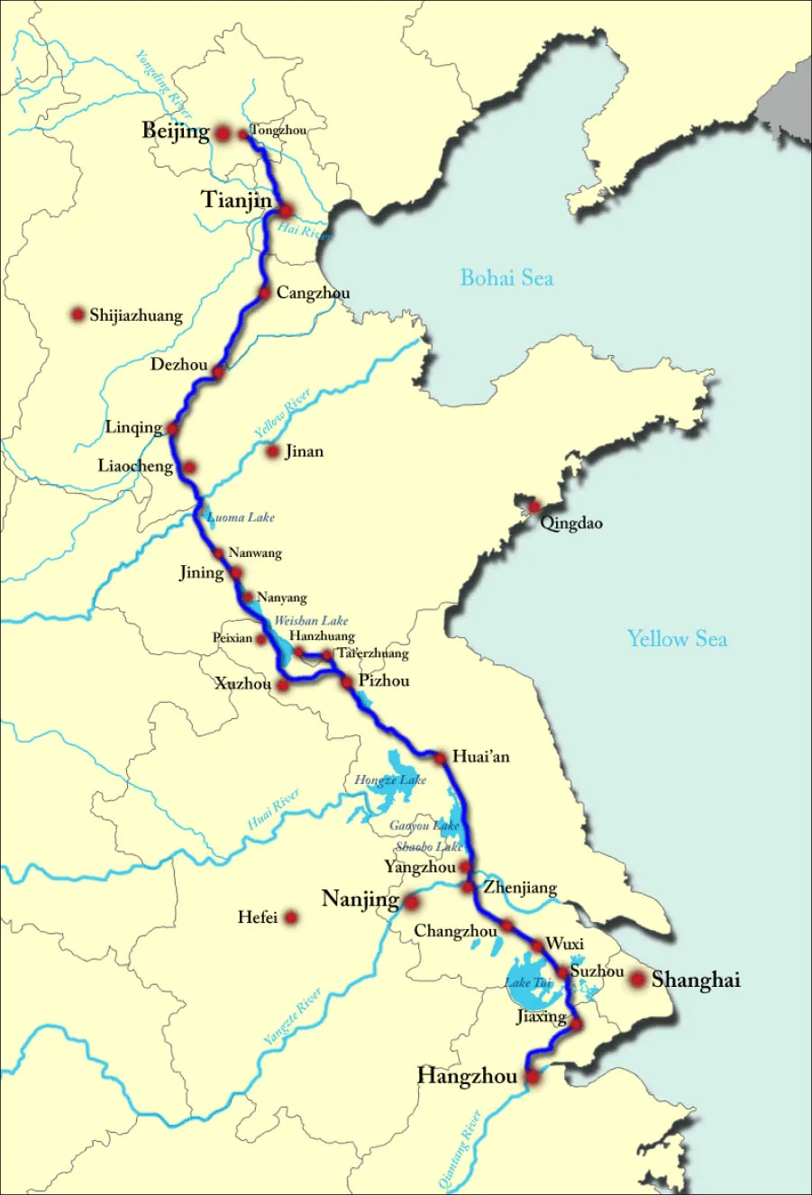 A map of an eastern portion of China is shown with the Bohai Sea and the Yellow Sea on the right. A blue line is shown starting from the north in Beijing and ending in the south at Hangzhou, passing through these cities along the way: Tongzhou, Tianjin, Changzhou, Dezhou, Linqing, Liaocheng, Nanwang, Jining, Nanyang, Peixian, Xuzhou, Pizhou, Huai’an, Yangzhou, Zhenjiang, Changzhou, Wuxi, Suzhou, and Jiaxing. At Pizhou the blue line heads north through Tai’erzhnang and ends at Hanzhuang. Other cities that are labeled from north to south are: Shijiazhuang, Jinan, Qingdao, Nanjing, Hefei, and Shanghai.