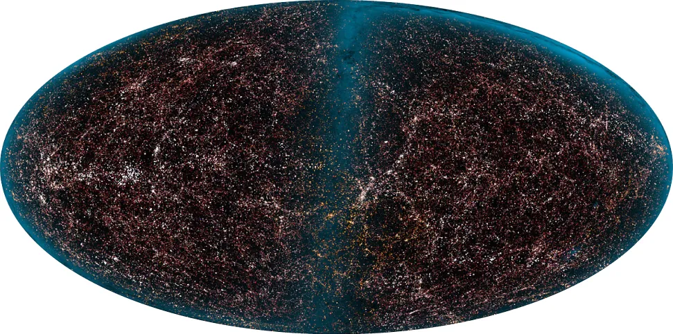 La imagen muestra una forma ovalada con un fondo negro. En su interior se ven muchas galaxias.