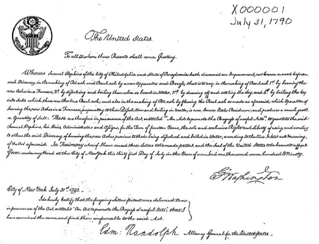 An image of the first US Patent. In barely legible writing, the patent number X 0 0 0 0 0 1 is seen with the date July 31 1790. The United States Seal is visible. 