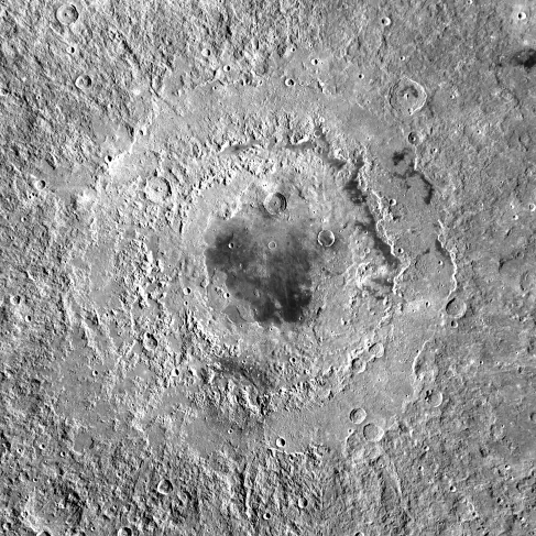 Image of Mare Orientale. A huge impact basin not seen directly from Earth, with many terraced rings extending out about 500 km from the flat, lava-filled central basin.