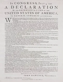 One of the Dunlap Broadsides is shown. It is headed, “In Congress, July 4, 1776, A Declaration By the Representatives of the United States of America, In General Congress Assembled.”