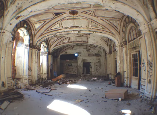 An image of the inside of a dilapidated building.