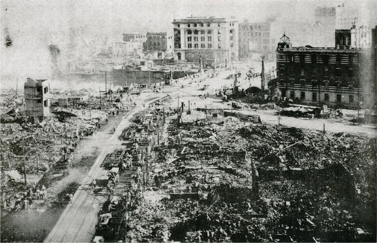 The photograph of the city shows the rubble of many buildings that have collapsed.