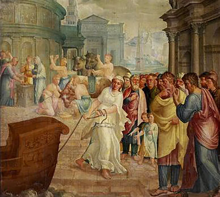 An image of a faded, richly, colored painting is shown. In the left forefront of the image, the front of a brown boat with the front decorated with carvings is seen in wavy water. The front of the boat is higher than the rest of the boat seen. It is being pulled by a brown string wrapped around the left arm of a barefoot woman dressed in a white ruffled dress with brown hair and a white cloth on her head. She is standing on rectangular bricked steps that lead to a street. To the right stand two small children dressed in robes, one light blue, and one very dark, with short hair and pointing their right fingers to where the woman is standing. Surrounding the children is a large group of people in long, dark robes, darker hair, all looking at the woman. Behind the woman to the left is a square stone structure where four people are standing and facing in pastel colored robes. One is seen drinking. Right behind the woman is a scene where three horned, large animals are being held by three figures while a fourth figure raises a long thin object above the animals head. In the far background faded buildings of a variety of shapes, sizes, and colors can be seen as well as a beige sky.
