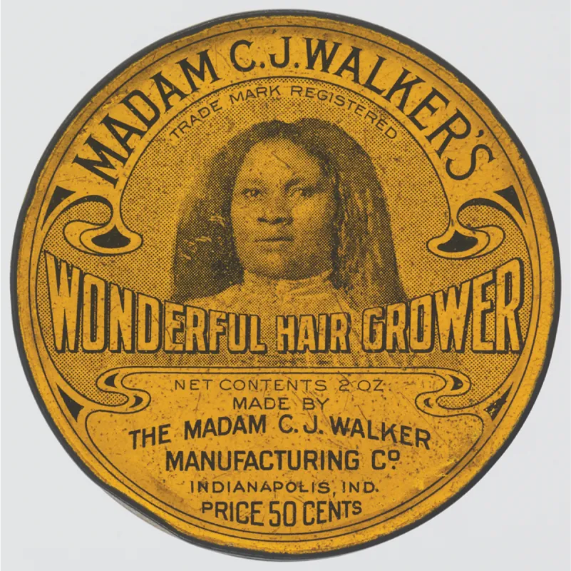 Image of a label for Madam C. J. Walker’s Wonderful Hair Grower. The label states: Net contents 2 oz. Made by the Madam C. J. Walker Manufacturing Co. Indianapolis, IND. Price 50 cents.