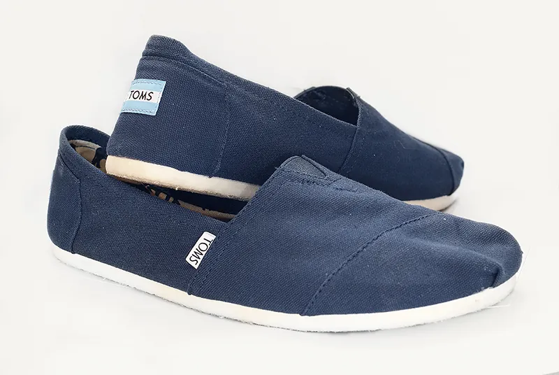 A pair of TOMS shoes.