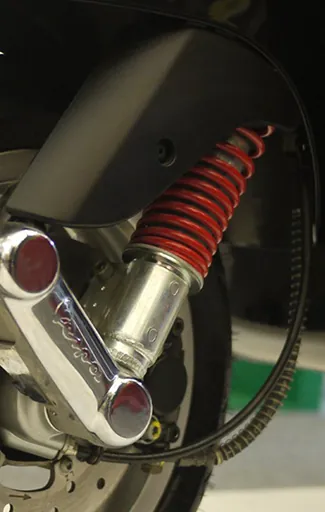 This picture is a shock absorber on a motorcycle.