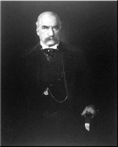 In figure (b), a photograph of J.P. Morgan is shown.