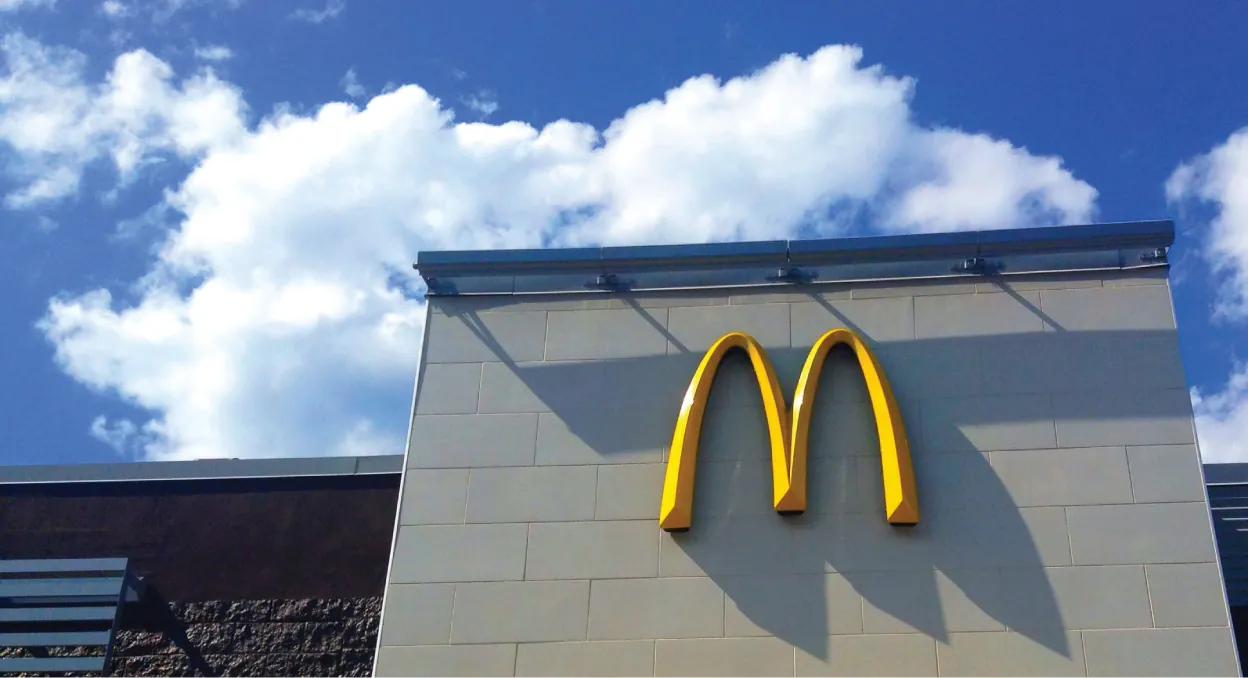 An image of the double arches of the McDonald's logo on a building