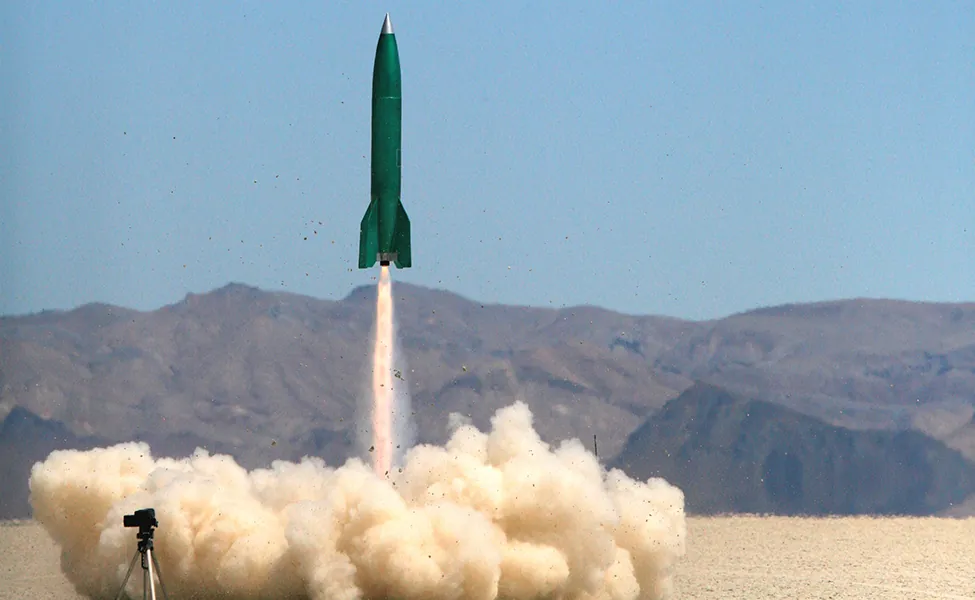 A photo of a rocket lifting off.
