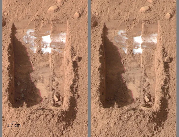 Evaporating ice on Mars. This image has two panels, and each of them show the same little “trench” excavated by the Phoenix lander. On the left, in the lower left portion of the rectangular trench, three gray spots can be discerned. The scale at lower left reads 1.7 c m. In the right hand image, taken four days later, the three spots have vanished.