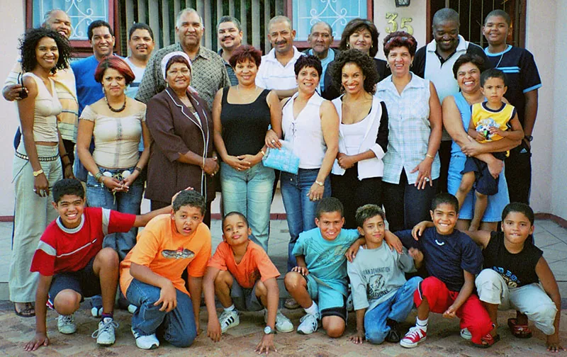 Several generations of an extended family in Pretoria South Africa posing for a portrait.