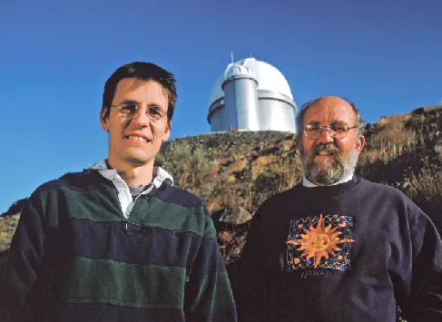 Planet Discoverers. An image of Didier Queloz and Michel Mayor, with an observatory in the background.
