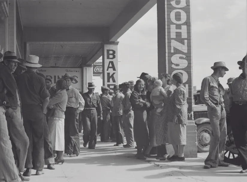 An image of people standing in long lines.