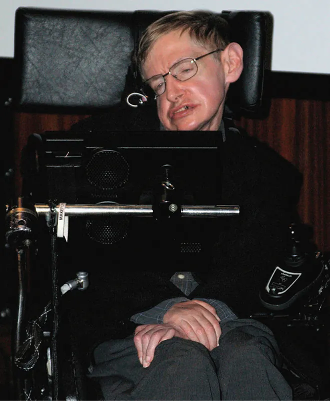 A picture showing the famous physicist Stephen Hawking in his wheelchair with his keyboard he uses to communicate.