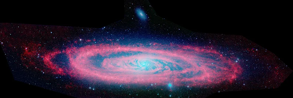 The elliptical-shaped Andromeda galaxy is shown.