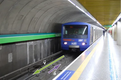 La imagen muestra un tren subterráneo que llega a una estación.