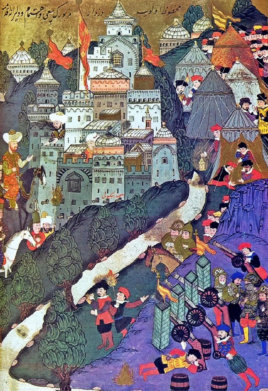 A colorful image is shown of a battle taking place in a city set in the hills. At the top left of the image many buildings are shown set close together in various colors of brown, blue, white, and red. Some have domes, some have tiled roofs, and some have pointed or notched tops. Red flags fly from poles on three of the buildings. Two oversized figures in white turbans are seen peeking out from behind some buildings. Cannons stick out some of the windows in the lower buildings. A dark blue mountain shows behind the buildings and four other white domed buildings are seen behind the mountains. To the right of the city are five slate and orange colored tents anchored to the ground with white ropes and gold ornaments at the top. Surrounding the tents are various figures in hats and colorful attire. A gold flag is seen flying on a pole with the group of figures behind the farthest tent. Left of the city buildings are two very large figures on horses dressed in richly decorated long robes and large hats. Two other figures in tall hats and robes stand in front of the horses, one with a tall stick on fire in his hand. In front of them are blue mountains and green trees, then a river. On the right side of the river two figures in green armor and helmets ride horses while six figures in colorful hats hide behind them behind the hillside. In front of the riders are two figures in red, black, and white outfits with hats holding weapons and a stick with fire. In the bottom right foreground of the image four stone towers are seen, one with a gold flag flying at the top. Between the towers three cannons are nestled, with a fourth at the top right. Various figures in colorful clothing and armor are seen standing and laying around the cannons and aiming them at the city.