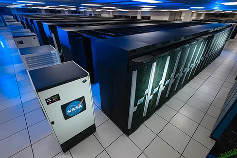 Photograph of the rows of supercomputers at NASA’s Ames Research Center.