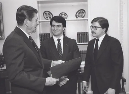 An image of Jack Abramoff standing between Ronald Reagan and Grover Norquist.