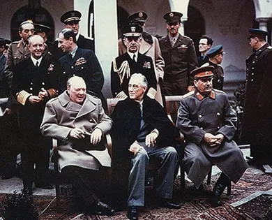 A photograph shows Winston Churchill, Franklin Roosevelt, and Joseph Stalin seated together at Yalta, surrounded by officials and military.