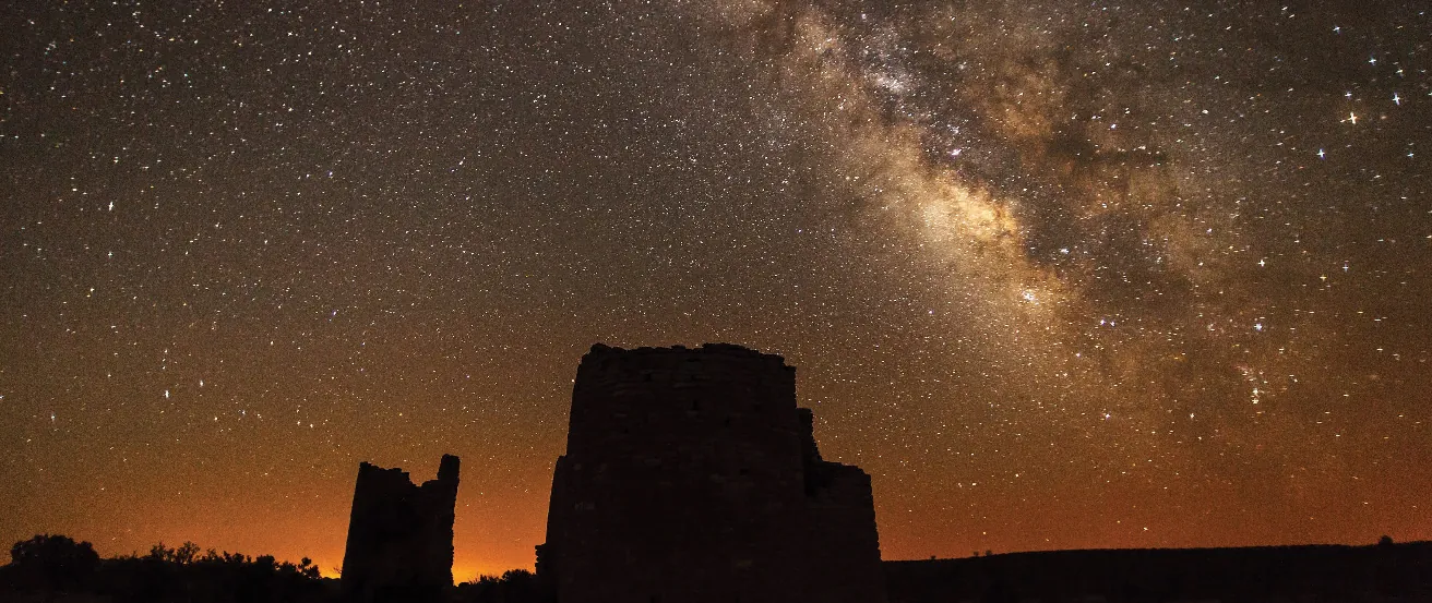 The Milky Way. The central bulge of the Milky Way (to the right of center) shines brightly in the dark Utah skies. Silhouetted in the foreground is Square Tower in Hovenweep National Monument.