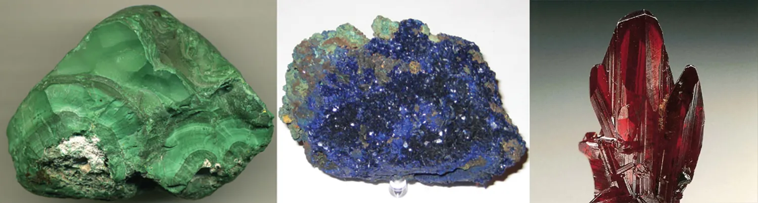 This figure contains three photos. The first is of a jade green mineral chunk with a darkened regions and a matte surface. The second is of a crystalline mineral chunk composed primarily of bright royal blue shiny crystals and some lighter blue crystalline regions. The third is of long red crystals.