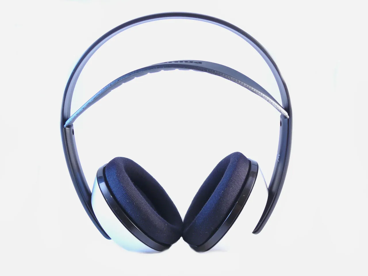 Shown is a pair of adjustable, black, over-the-ear headphones.