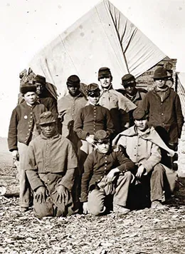 A photograph shows a small group of casually posed Black and White Union soldiers.
