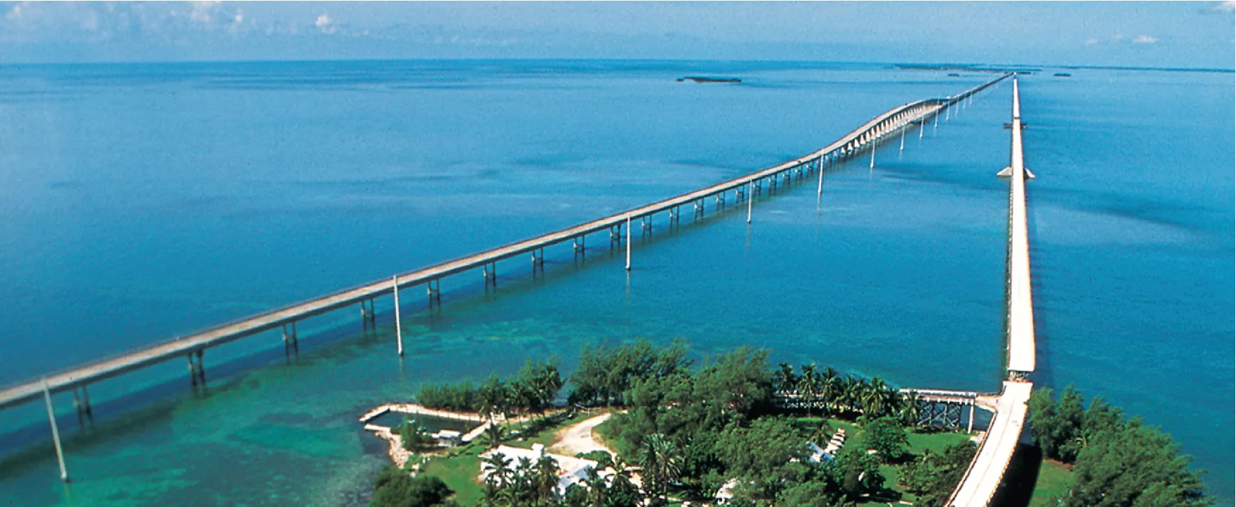 Photo of a bridge extending into the ocean to the Florida Keys.