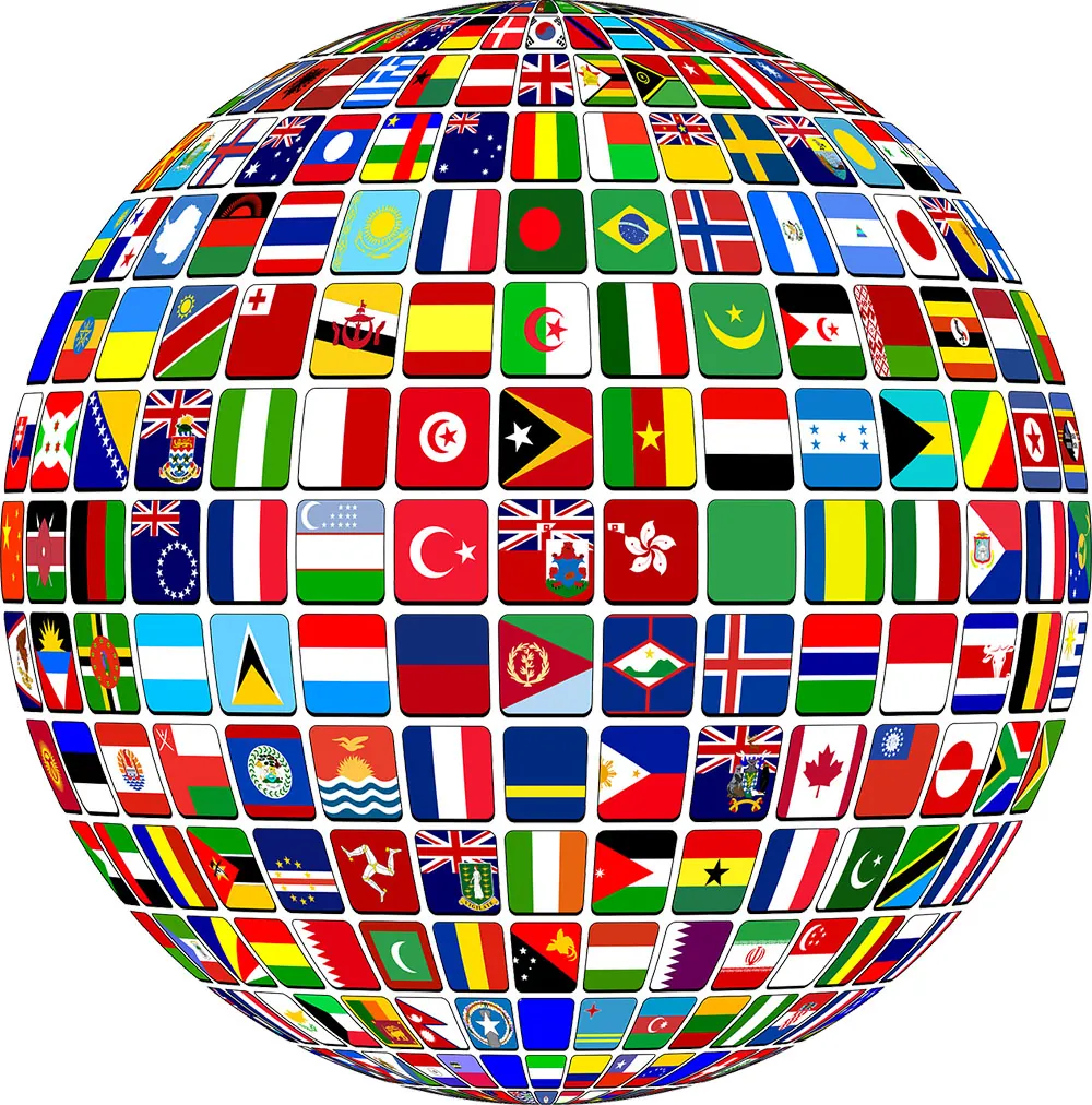 An illustration of a globe covered in the flags of the world’s nations.