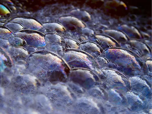 A picture of soap bubbles is shown.