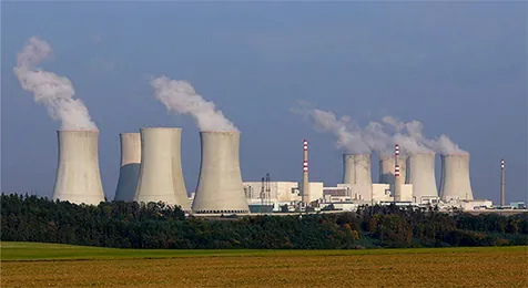 The photo shows gases releasing from a power plant.
