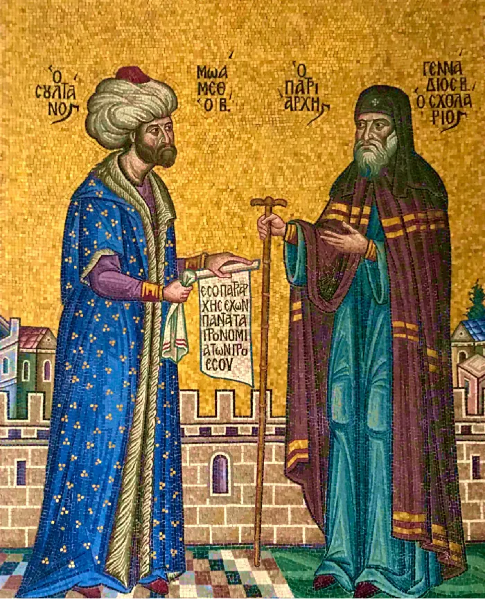 An image of two men on a yellow mosaic background is shown. The man on the left has a black beard, wears a long blue robe with gold accents and gold trim, a large white turban with a red top on his head, and a serious expression. He holds a scroll with text on it in his left hand and a handkerchief in his right. The man on the right facing him has a white beard, wears a blue gown with a red cape over his shoulders and also has a serious expression on his face. On his head he wears a black cloth with a cross in the middle. He extends his left hand to the other man and holds a walking cane in his right hand. Castle walls are behind them.