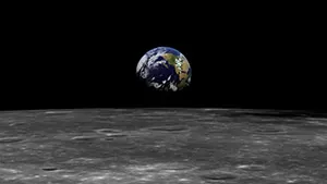 A photograph taken from the moon shows Earth in the distance.