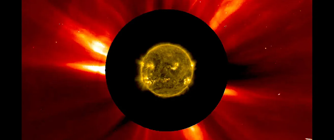 An image of the Sun. In the center is a satellite picture of the sun, which is surrounded by a thick black circle. Expanding all around the circle are the ray-like projections of coronal mass ejections.