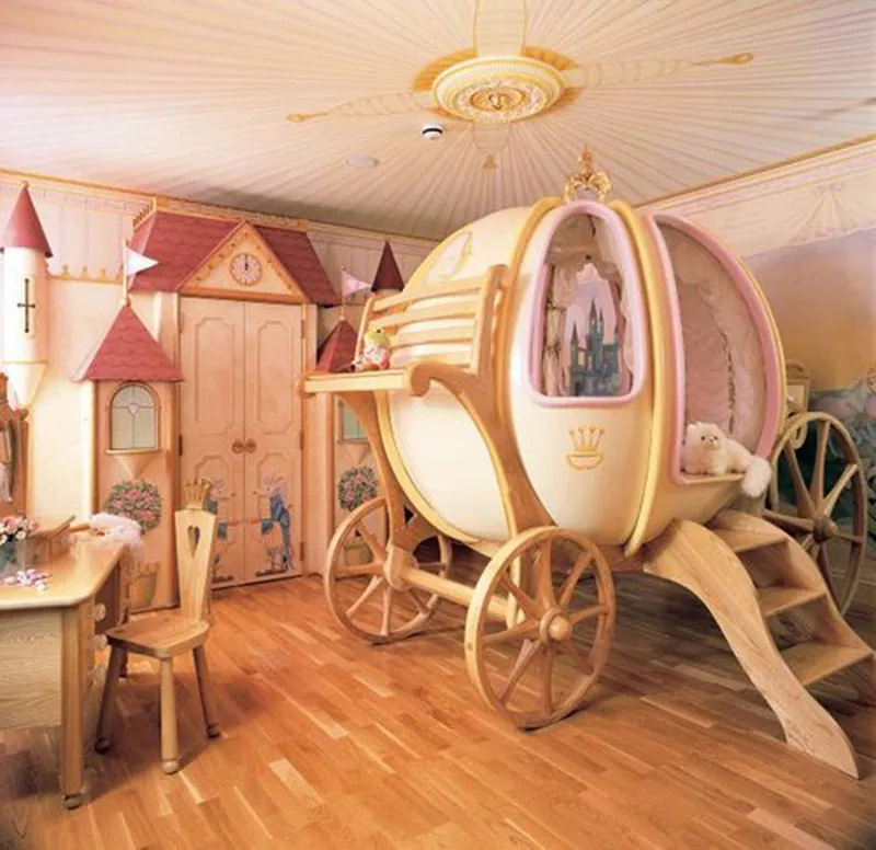 A child's bedroom with numerous design elements meant to depict a castle and fantasy. The crib appears to be a carriage like Cinderella's, and the closet has been remade to appear like a castle.