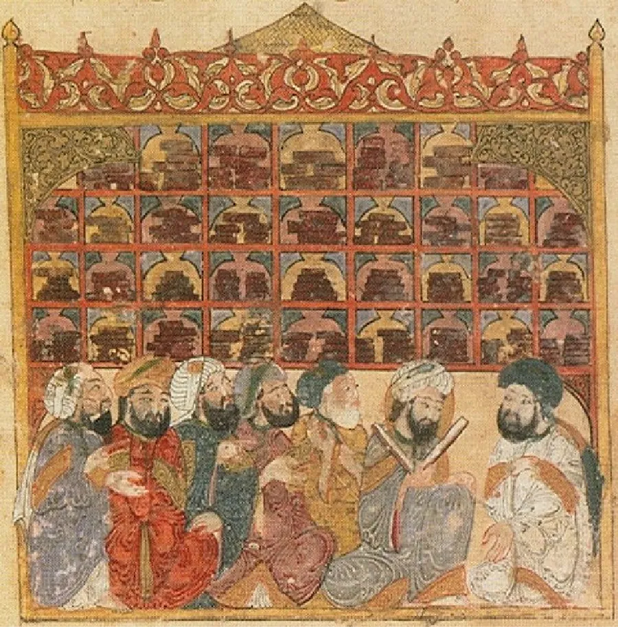 A picture of a drawing is shown. Six bearded men are seated on the ground facing a seventh bearded man on the right who is extending his hand out toward the ground. They all wear long solid-colored robes and various turbans on their heads. All of them have black, almond-shaped eyes and black beards, except for one man who has a white beard. One of the men holds two thin white and brown items in his hands. Behind them are shown thirty-three squares in three rows of nine and one row of seven at the top, partially hidden by a green and yellow lattice archway. Inside the square sit stacks of brown books in front of yellow and pink jugs. Red and gold designs are shown across the top of the picture with a gridded gold pyramid shown above the designs in the middle.
