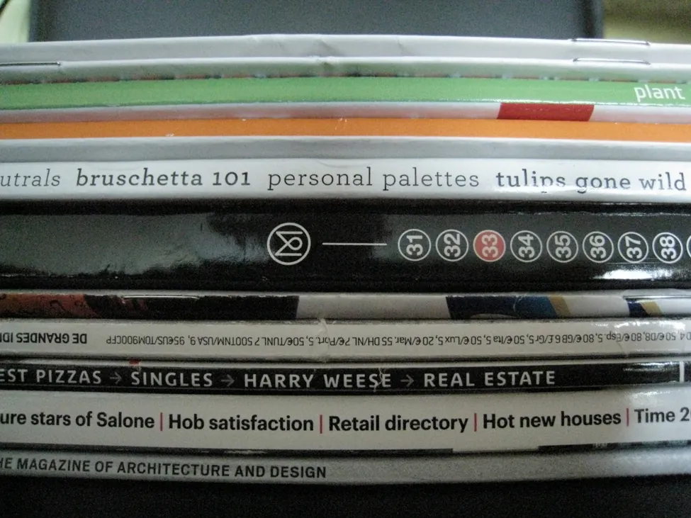 This is a photo of magazine spines. The magazines cover various topics like plants, food, and architecture.