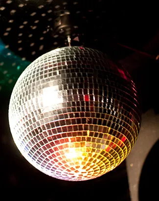 This figure shows a disco ball suspended from a ceiling.