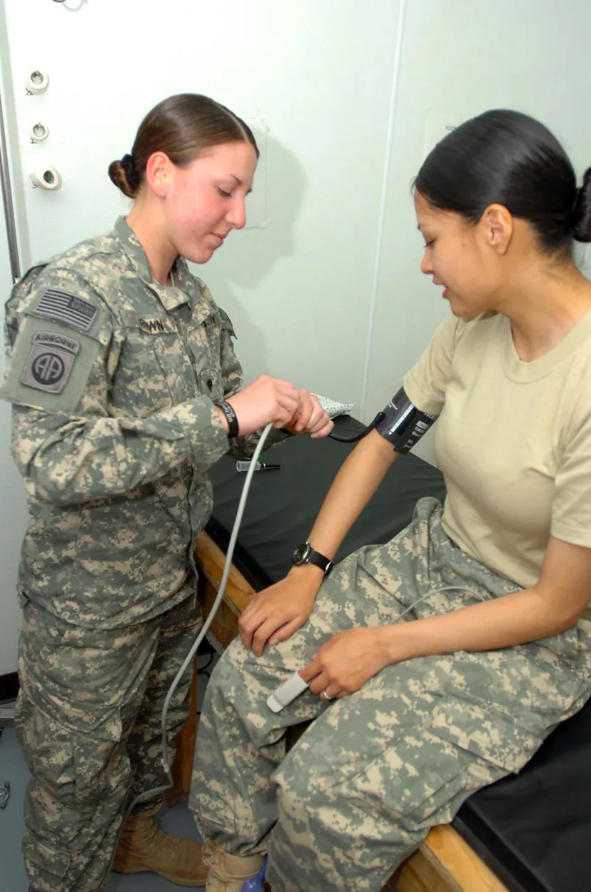U.S. Army Spc. Monica Brown takes a soldier's blood pressure reading at the hospital on Forward Operating Base Salerno, Afghanistan, March 10, 2008.