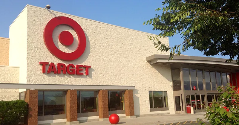 A photo of a Target storefront. The large, red bullseye logo is visible on the building.