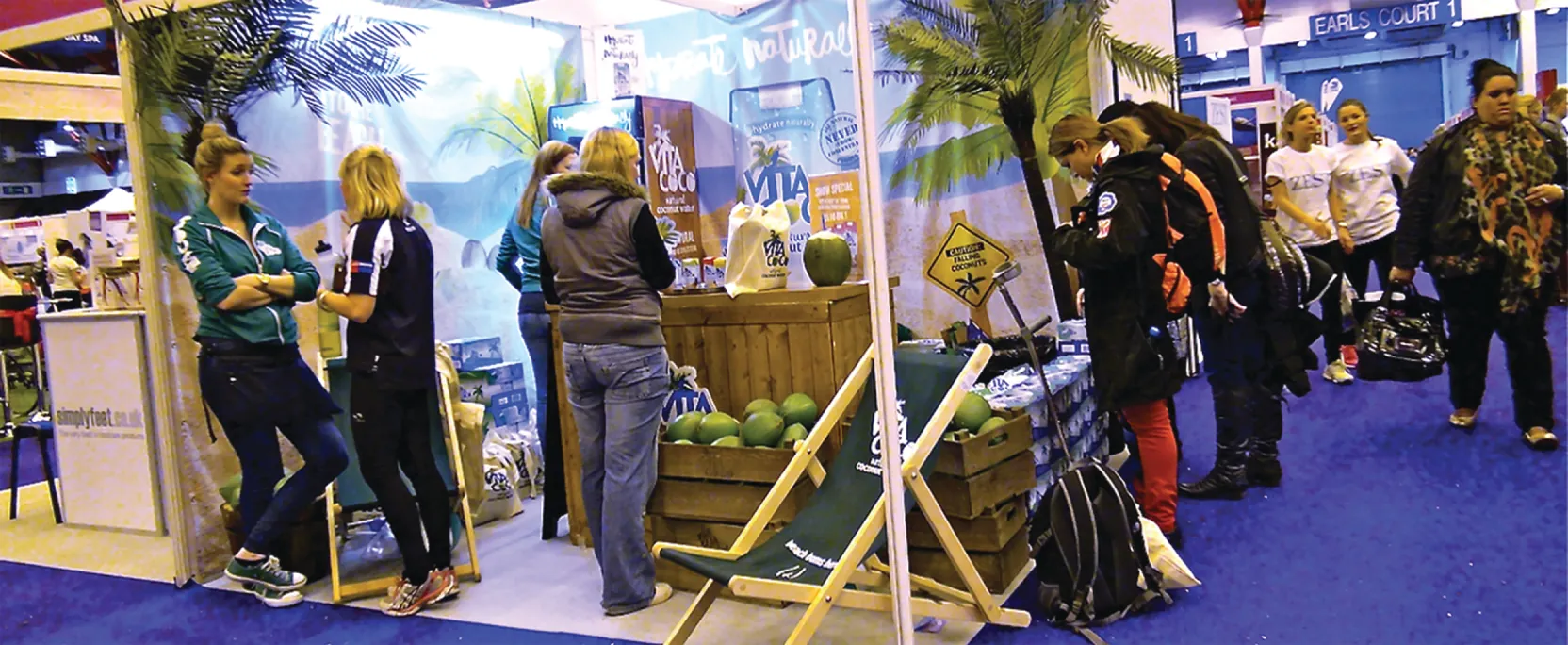 Photo of a Vita Coco booth at a convention.