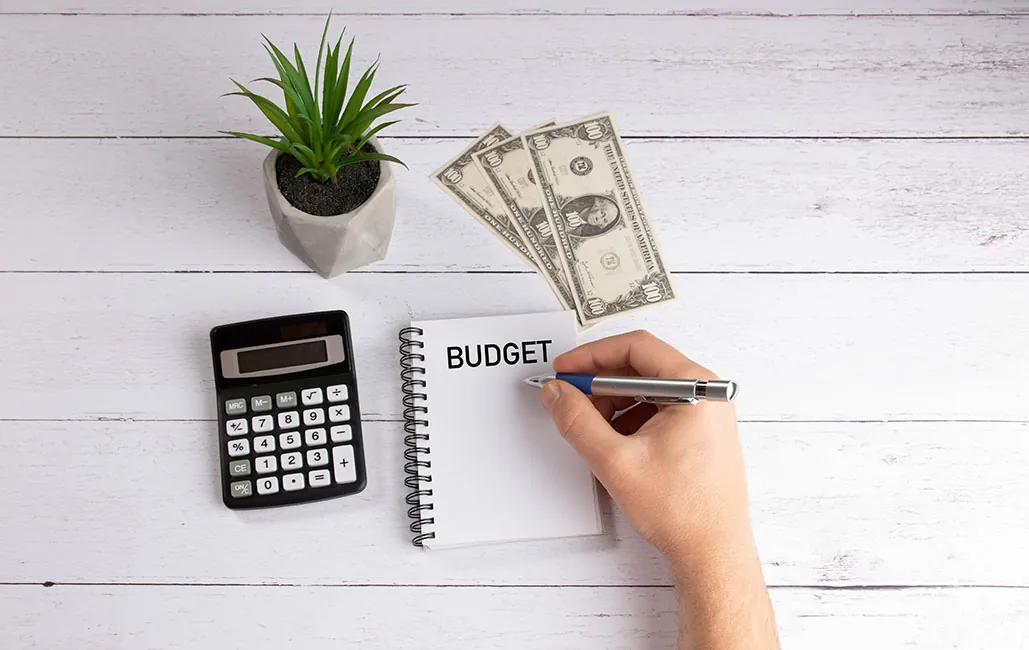 A person is calculating their budget.