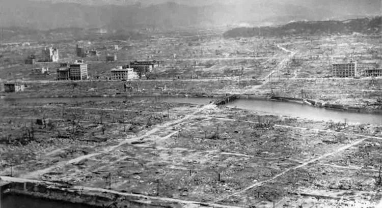 The figure shows a barren landscape with a few buildings here and there.